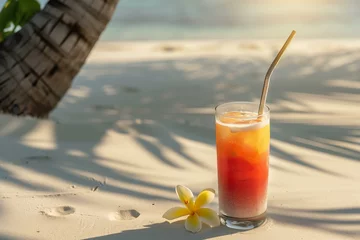 Abwaschbare Fototapete refreshing colorful cocktail with a metal straw on a white sand beach close up, palm trees and sea in the background, plumeria flowers by the cocktail © World of AI