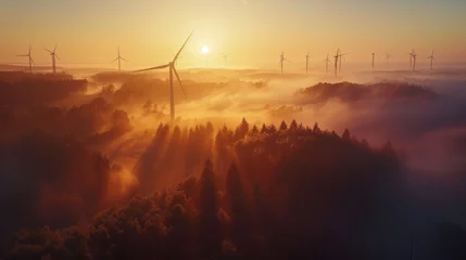 Rolgordijnen Dawn breaks over a serene landscape, its first light illuminating wind turbines among nature © Chingiz