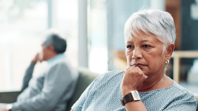 Senior couple, argument and sofa with fight for conflict, divorce or breakup in living room at home. Frustrated elderly man and woman ignore in disagreement, toxic relationship or living rom dispute