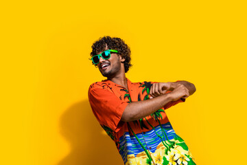 Photo of cool man with afro hairdo dressed print shirt in sunglass dancing look at sale empty space...