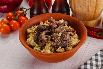 Traditional couscous with beef and vegetables