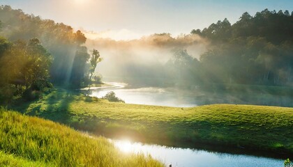 misty morning over the river in the countryside