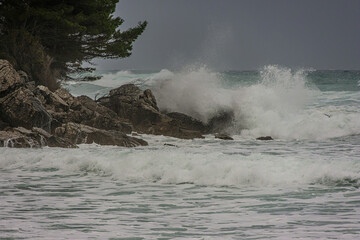 waves breaking on the rocks