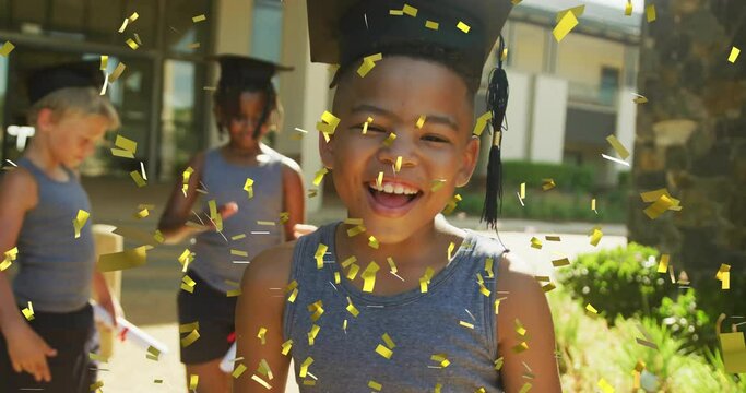 Animation of gold confetti over happy biracial schoolboy wearing mortarboard outside school