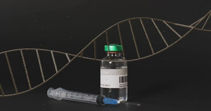 Animation of dna strand over syringe and vaccine vial on black background