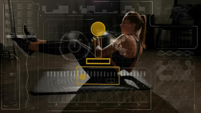 Animation of charts processing data over fit caucasian woman working out at gym with exercise ball