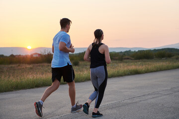 Dynamic Duo: Fitness-Ready Couple Embraces Confidence and Preparation for Upcoming Marathons