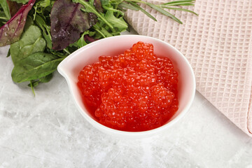 Red caviar in the bowl