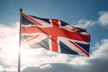British flag flies on a flag pole in England - obrazy, fototapety, plakaty