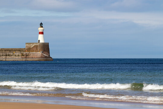 The Golden Horn lighthouse in Fraserburgh, Scotland as seen from the beach