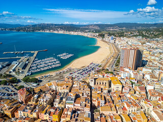 Aerial glimpses of Palamos highlight its strategic location as a gateway for European tourism, offering access to both coastal delights and cultural experiences.
