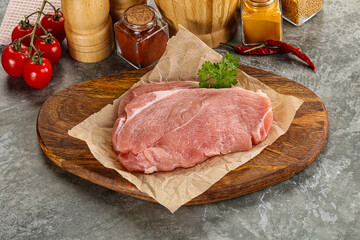 Raw pork schnitzel for cooking