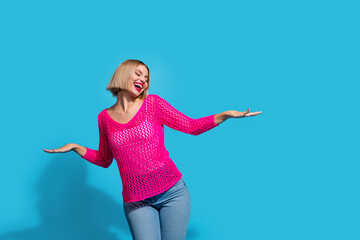 Photo portrait of pretty young girl dance clubbing have fun dressed stylish pink knitwear outfit...