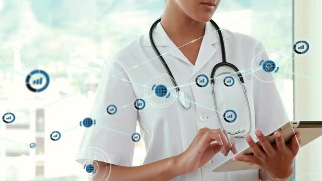 Animation of network of data communication icons over caucasian female doctor using tablet