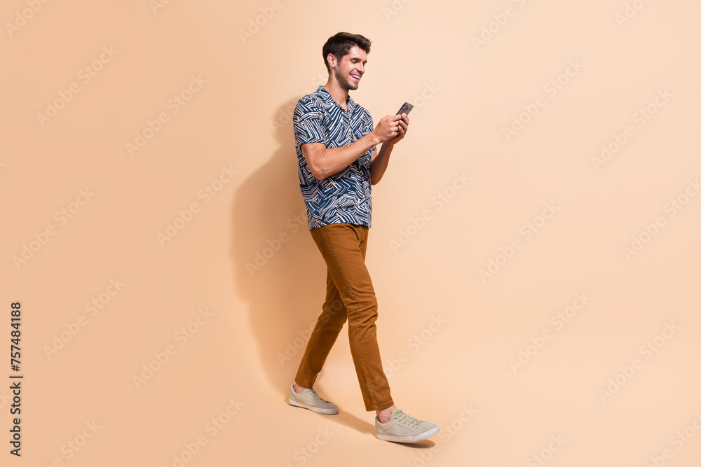 Poster full length body photo of young business guy using smartphone texting to girlfriend he want date iso