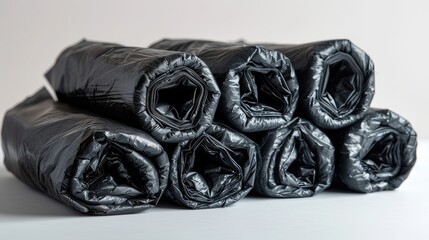 multiple rolls of black garbage bags, offering hassle-free disposal solutions for a clean and hygienic home