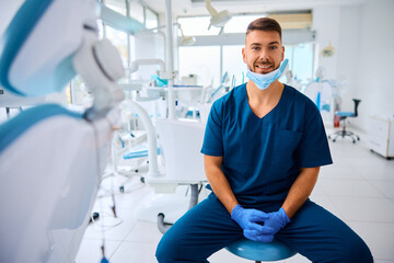 Fototapeta premium Portrait of happy dentist looking at camera.