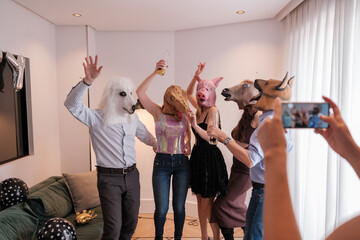 Group of friends with animal masks at a different party. Concept: fun, celebration