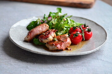 beautiful light background of grilled meat on salad, healthy traditional light meal