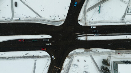 Obraz premium Drone photography of an intersection in a city during winter day