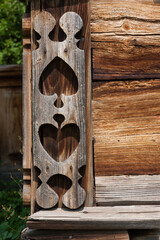 Old wooden country house, decorative detail - 757495379