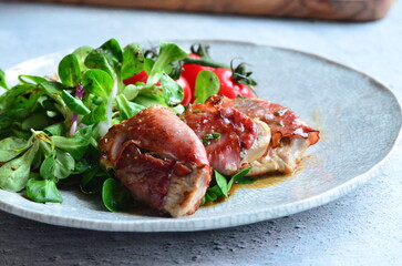 Saltimbocca. Veal schnitzel with sage and Parma ham. Italian specialty. close up view, yummy