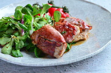 Saltimbocca. Veal schnitzel with sage and Parma ham. Italian specialty. close up view, yummy