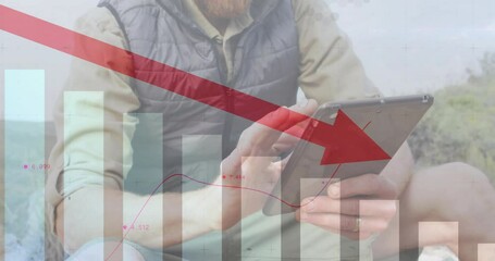 Animation of financial data processing over caucasian man using tablet in mountains - Powered by Adobe