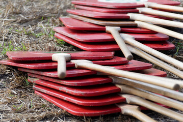 Stack of red shingles used for the traditional swiss sport hornussen