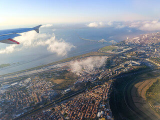 Aerial view of the Eastern part of Lisbon with Vasco da Gama Bridge, Tejo park and Trancão river,...