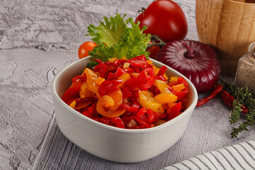 Diced raw bell red and yellow pepper