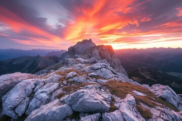 Rocky Mountain Ridge Against A Fiery Sunset - obrazy, fototapety, plakaty