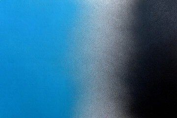 black and blue color spray paint gradient on white color paper