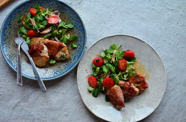 beautiful light background of grilled meat on salad, healthy traditional light meal