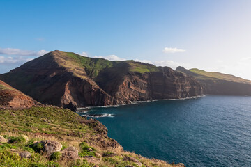 Panoramic view of majestic Atlantic Ocean coastline at Ponta de Sao Lourenco peninsula, Canical, Madeira island, Portugal, Europe. Coastal hiking trail along steep rocky rugged cliffs. Sea breeze. Awe
