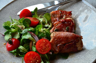 Saltimbocca. Veal schnitzel with sage and Parma ham. Italian specialty. close up view, yummy