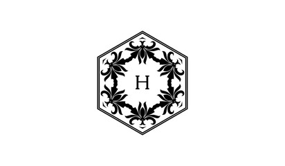 illustration of an ornament alphabetical logo