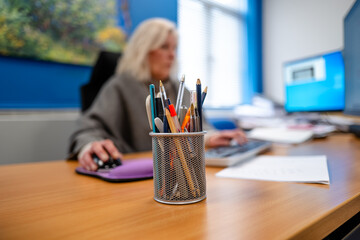 Pens and pencils on a desk 