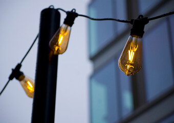 Close-up of illuminated light bulbs.