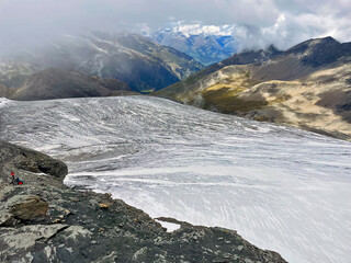 Trail to the Summit: Glacier Ridge Exploration in Val d'Isere, aiguille de la grande sassière, France