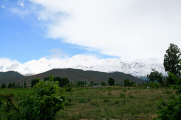 Fototapeta na wymiar Tian Shan Mountains at Issyk-Kul, Cholpon Ata, Kyrgyzstan