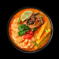 Spicy Asian soup, garnished with tofu, vegetables, and a variety of spices, offering a glimpse into the rich culinary traditions of Asian cuisine - 757547308