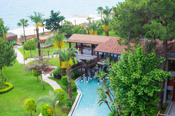 Tropical resort garden beach and sea. Vew from above.
