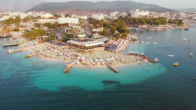 Amazing peninsula adorned with elegant hotels and beaches of azure Ionic sea of Ksamil beach Albania
