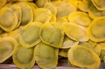 Italian food, fresh homemade stuffed pasta tortelli or ravioli dumplings ready to cook, Milan, Lombardy, Italy