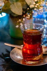 Turkish sweet tea served in traditional glass in restaurant in Istanbul, Turkey