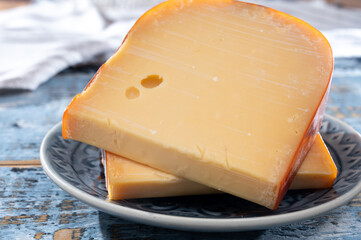 Cheese collection, Dutch ripe hard chees made from cow milk in the Netherlands in piece and sliced