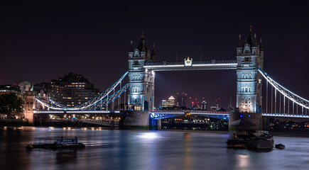 tower bridge at night and river Thames in long exposure 