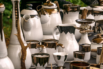 Handmade glazed clay pottery using wild animal horns. - 757568538