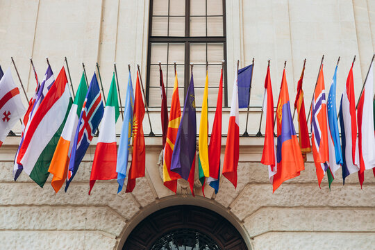 National flags of various countries flying in the wind. Colorful flags from different countries. Flags Organization for Security and Co-operation in Europe